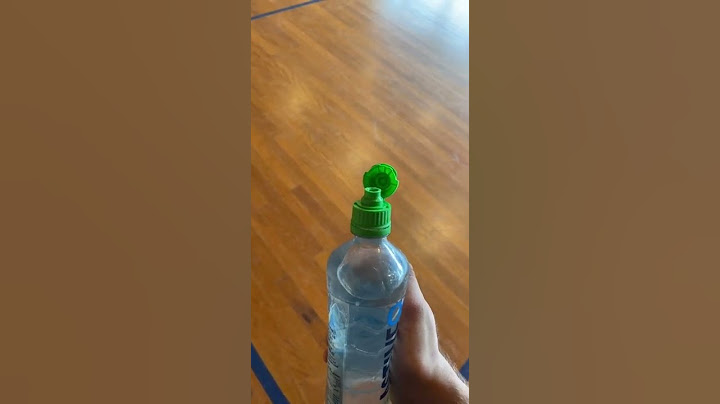 Small Water Slowly Squirts Out Of Green Top Water Bottle