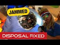 Jammed Garbage disposal Fixed and cleaned