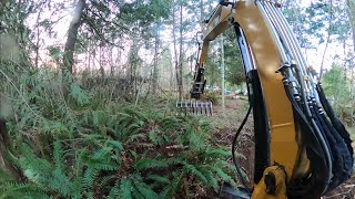 Clearing brush and running over my GoPro with excavator.