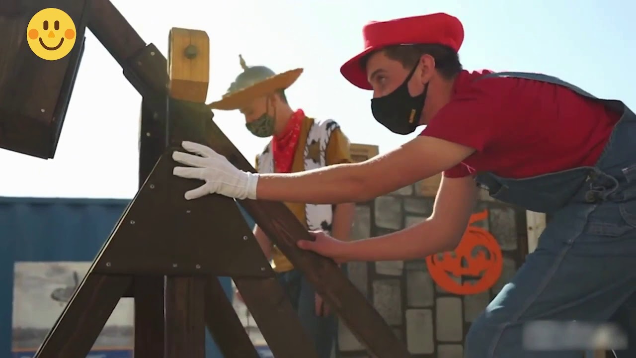 Group of Friends Build and Use Trebuchet to Launch Candy Towards Kids on Halloween