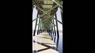 Two Minute Relaxing Atlantic Ocean Waves under the Fishing Pier on Oak Island in North Carolina.