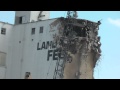 Crane destroys elevator Fort Dodge, Iowa. Awsome gigantic crane knocks down Land O Lakes Feed Mill