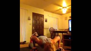 Stacked feet staggered hands push-ups
