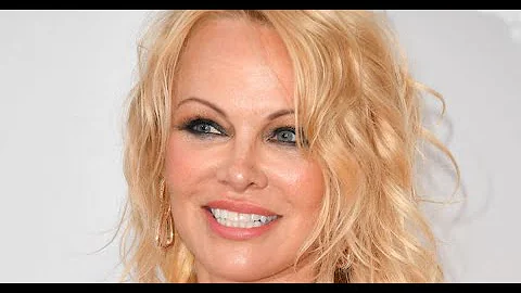 Pamela Anderson stuns in chic dress as she dines w...