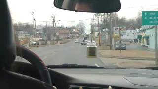 Irate driving instructor yells at student.