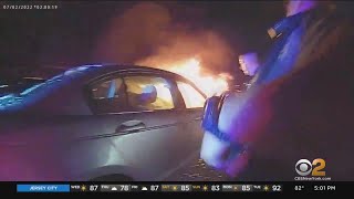 Dramatic rescue from burning vehicle caught on NJ police body camera