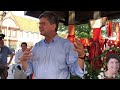 Rep. Brad Schneider speaks in Highland Park on one month anniversary of Fourth of July mass shooting