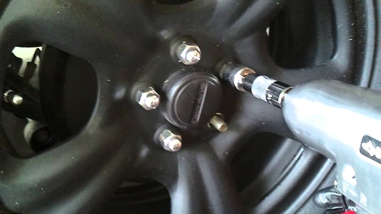 Impacting off lug nuts YouTube