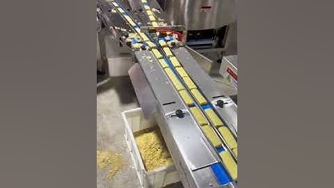 Full automatic feeding and packing system for egg roll by two turning dish.