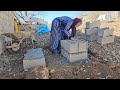 Nomadic Fortitude: Fatima's Resistance in Hot Water Tank Infrastructure Installation 🔧💪🏡