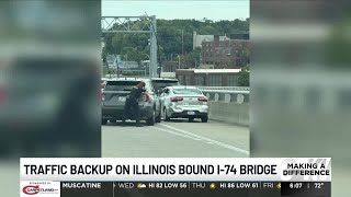 Large police presence gathered on I-74 Bridge, Tuesday afternoon, traffic flow resumes