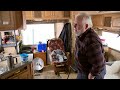 Why an insurance dispute has this man living in a trailer