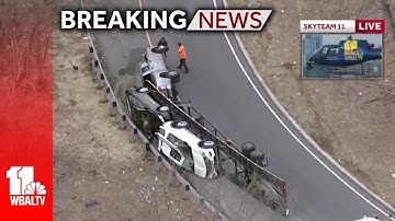 Car transporter overturns onto its side on I-95 exit ramp