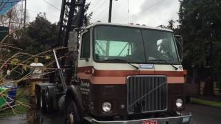 WhiteGMC Chain Lift Roll Off