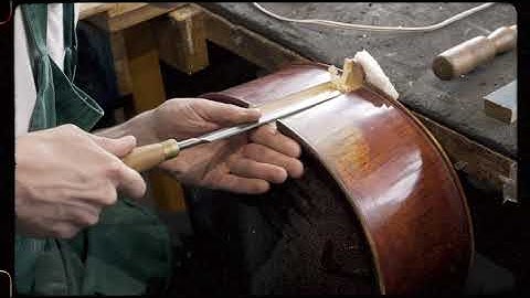 Bridgewood and Neitzert removing a cello neck