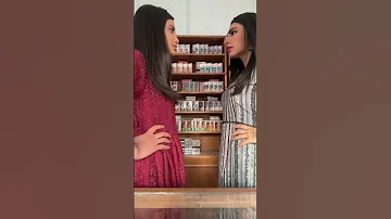 عواطف وعزيزه في محل الاشرطه شارع الاعشى 