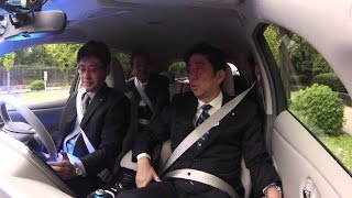 Japanese PM Shinzo Abe Rides in an Autonomous Drive Nissan LEAF