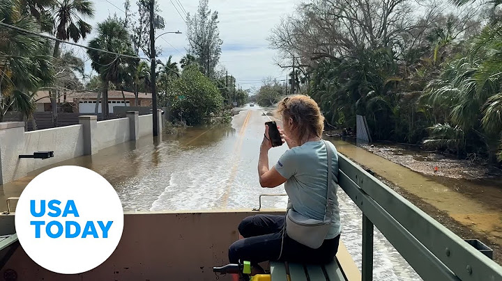 Siesta Key, Florida, community cleans up after Milton and Helene | USA TODAY
