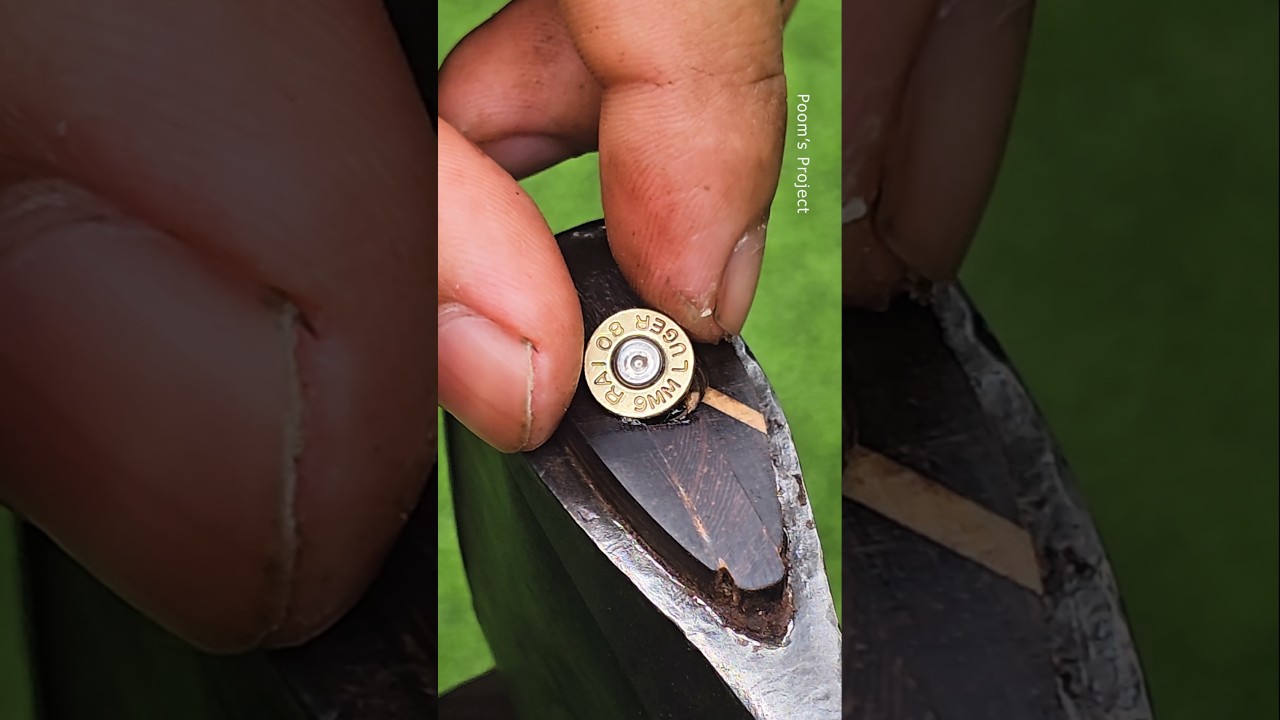 The art of axe handle installation decorated with 9mm shell casings 