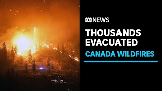 20,000 evacuate from Canadian wildfires | ABC News
