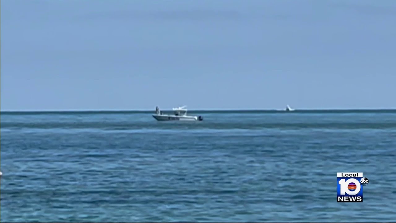 Helicopter pilot survives crash off Key Biscayne - YouTube