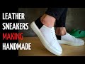 Leather sneakers in black and white colours by handmade