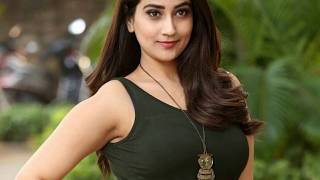 Anchor Manjusha Long Hair Photo Shoot In Green Top Skirt