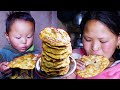 Rita cooking oil bread and eating with son ridam lifeinruralnepal