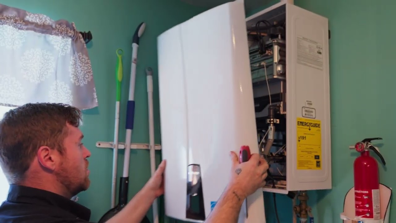A Stanley Plumbing technician getting to work