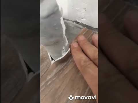 Как постелить линолеум за трубой у стены