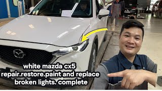 mazda cx5 white repair restore paint and replace broken lights.$18.000 complete.minh car restoration