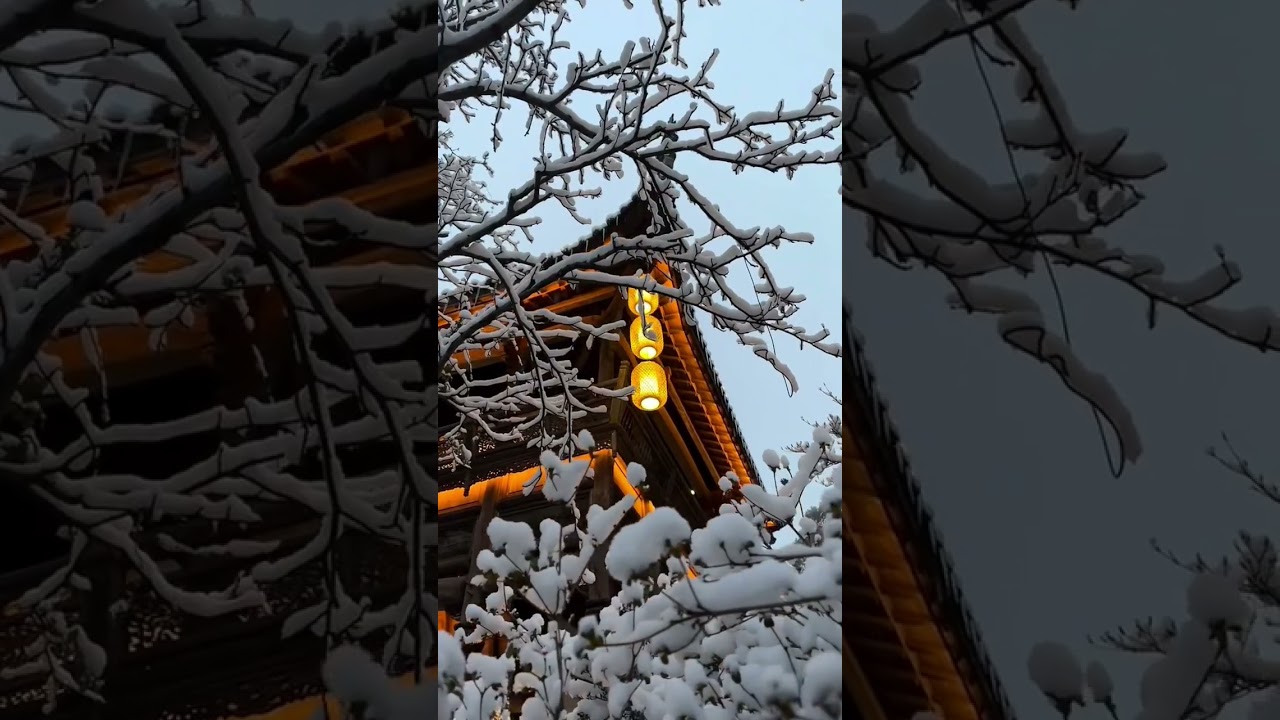 Snowy night scene in Huangling Ancient Village Scenic Area. 