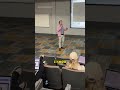 This professor slid on a skateboard to enter the class shorts
