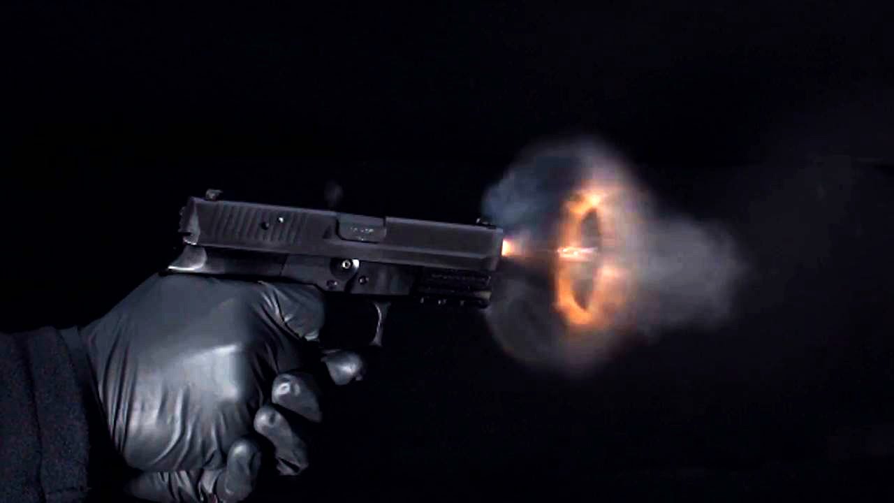 Super slow-motion video of bullets leaving a handgun
