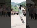 Skateboard girl, like a fairy descending to the mortal world, beautiful mountains and waters, beau
