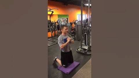 Kneeling Overhead Pallof Press  - Elite Training Institute