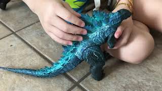 Presley naming Godzilla and King Kong toys with movie year