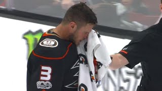 Bieksa forced to leave after getting caught by Goligoski's high stick