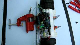 robot sumo pushing a metal object