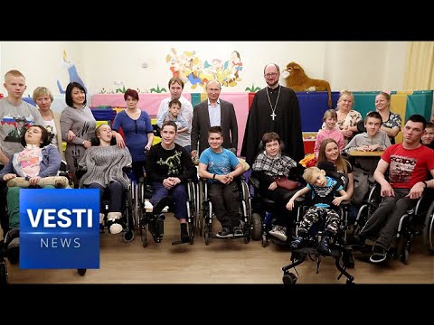 Christmas Eve in Russia: Putin Visits Children’s Hospital in St. Petersburg Bearing Gifts newspaper mockup