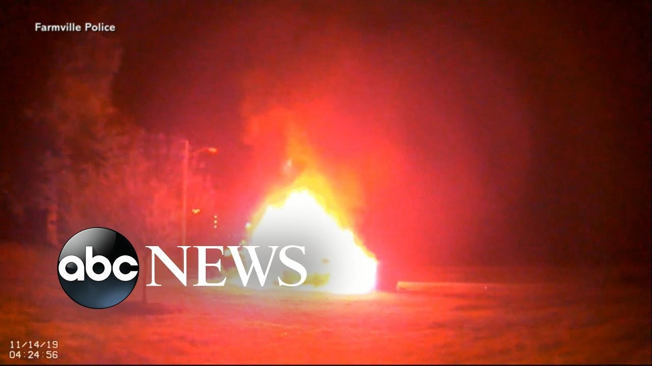 Police video shows dramatic rescue as officer saves woman from burning car | ABC News