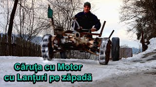 Caruta cu Motor iarna, cu Lanturi pe Zapada