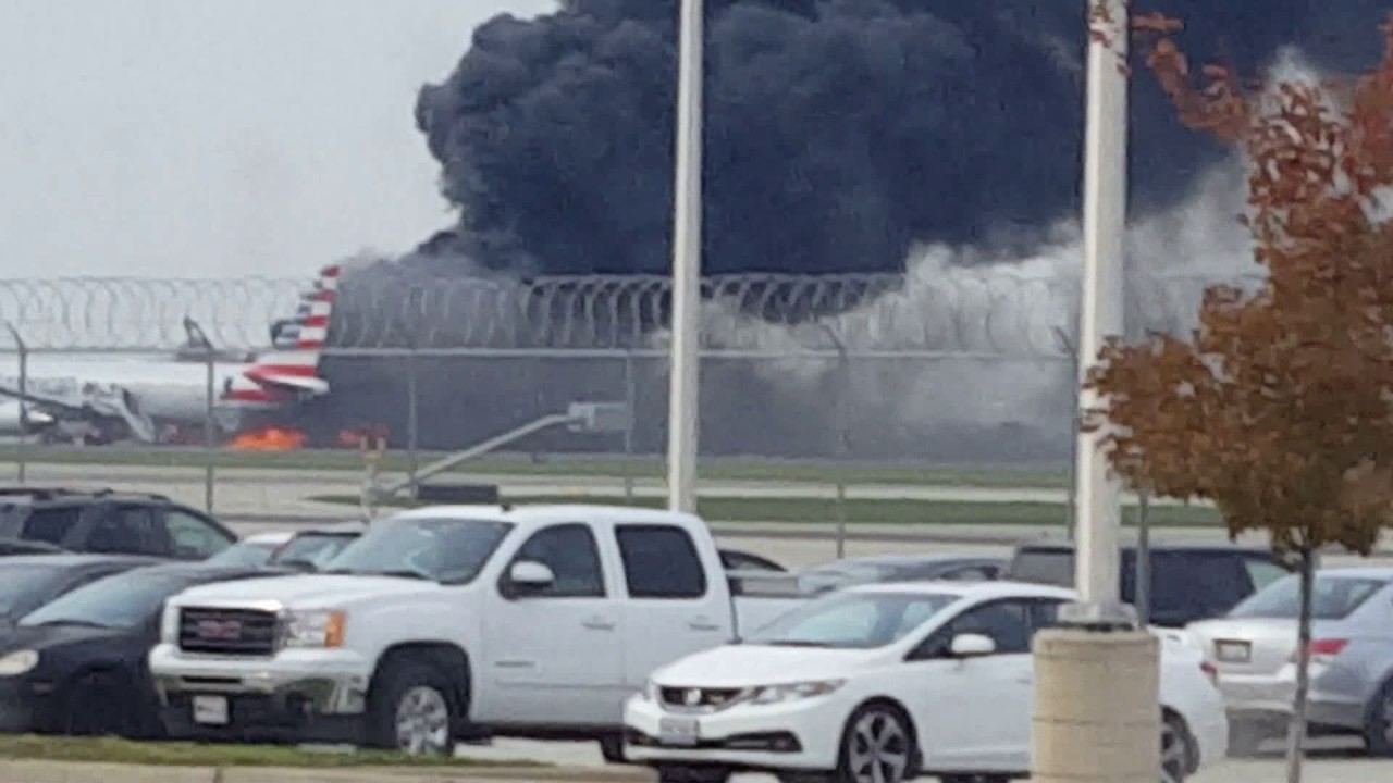 American Airlines plane on fire at O'Hare YouTube