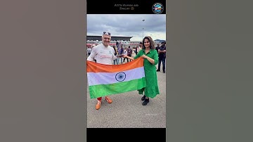 Ajith Kumar and Shalini handling the national flag at racing time😍#2day_update #ajithkumar #shalini