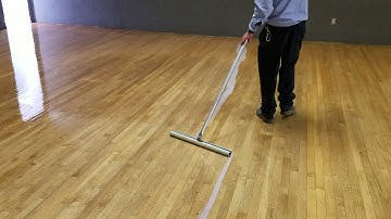 WAXIE demo applying a second coats of gym finish