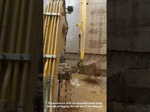 Two excavators work