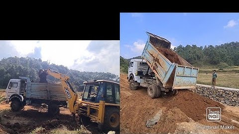 jcb loading soil in a TATA 1618 dump truck || jcb loading mud in a truck