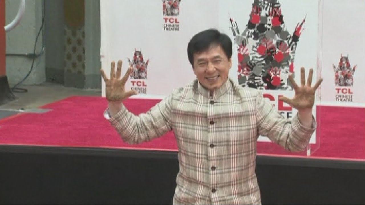 Jackie Chan leaves prints at the Chinese Theatre for the second time