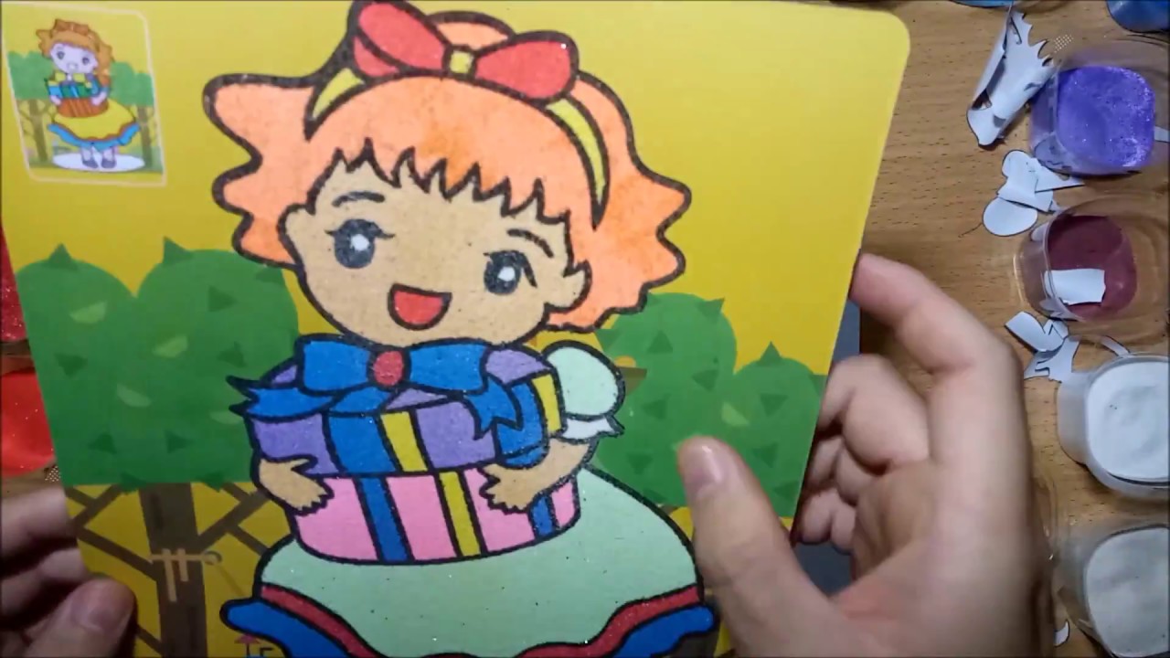 a girl with gift box colored sand art for kids | Sand Art and Paper Clay for Kids