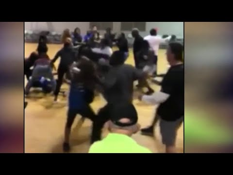 School district investigating video of young girl punched by grown man at youth basketball game